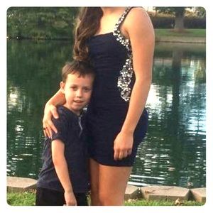 Navy dress with single shoulder strap